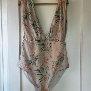 Women’s tropical one piece swimsuit.